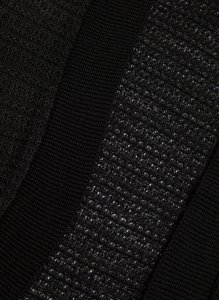 Boléro en tricot pointelle