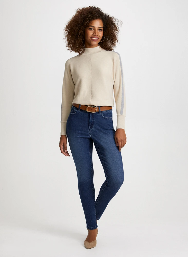 Pull ottoman et jean bleu étroit