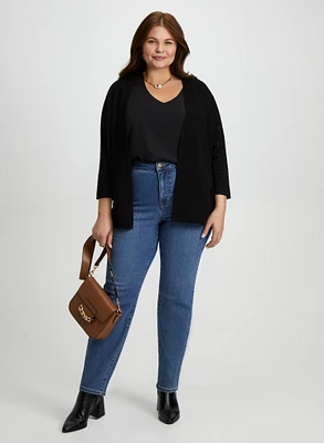 Cardigan ouvert et jean étroit