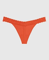 Tanga à taille en V avec bordure dentelle