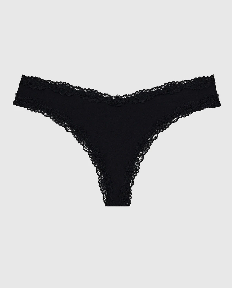 Tanga avec bordure en dentelle noire