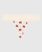 Tanga avec bordure en dentelle révérence à la reine
