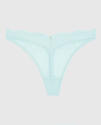 Tanga à jambe échancrée en dentelle bleu de méthylène