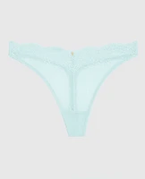 Tanga à jambe échancrée en dentelle bleu de méthylène
