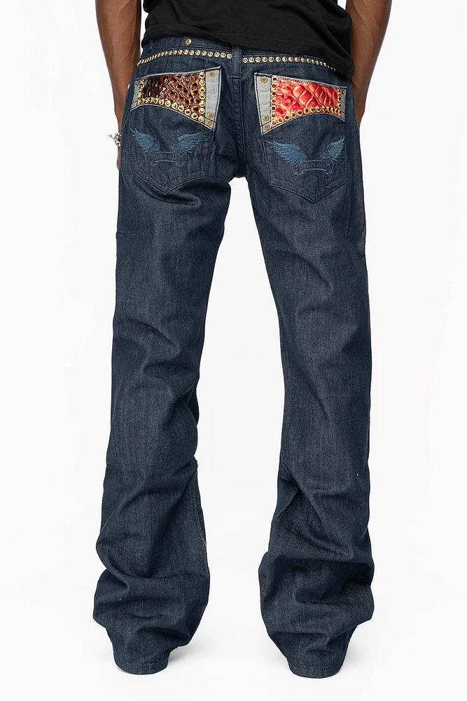BOOT CUT JEAN WITH PATENT LEATHER POCKET EMBELLISHED CRYSTALS AND STUDS RINSE WASH