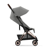 Poussette Coya - Cadre or rose avec siège gris mirage