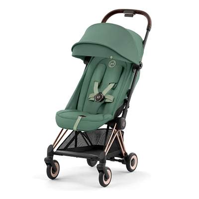 Poussette Coya - Cadre or rose avec siège vert feuillage