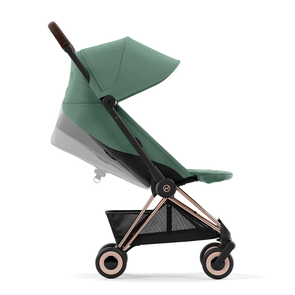 Poussette Coya - Cadre or rose avec siège vert feuillage