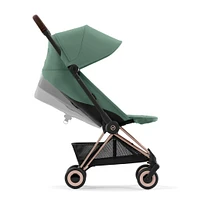 Poussette Coya - Cadre or rose avec siège vert feuillage