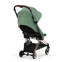 Poussette Coya - Cadre or rose avec siège vert feuillage