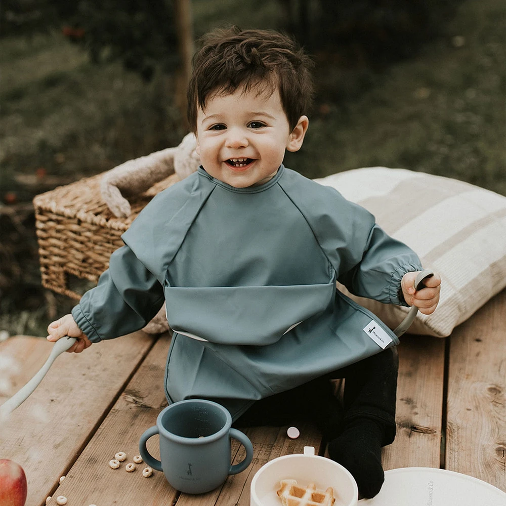 Long-sleeved Bib with integrated pocket 6-24m - Majestic Blue