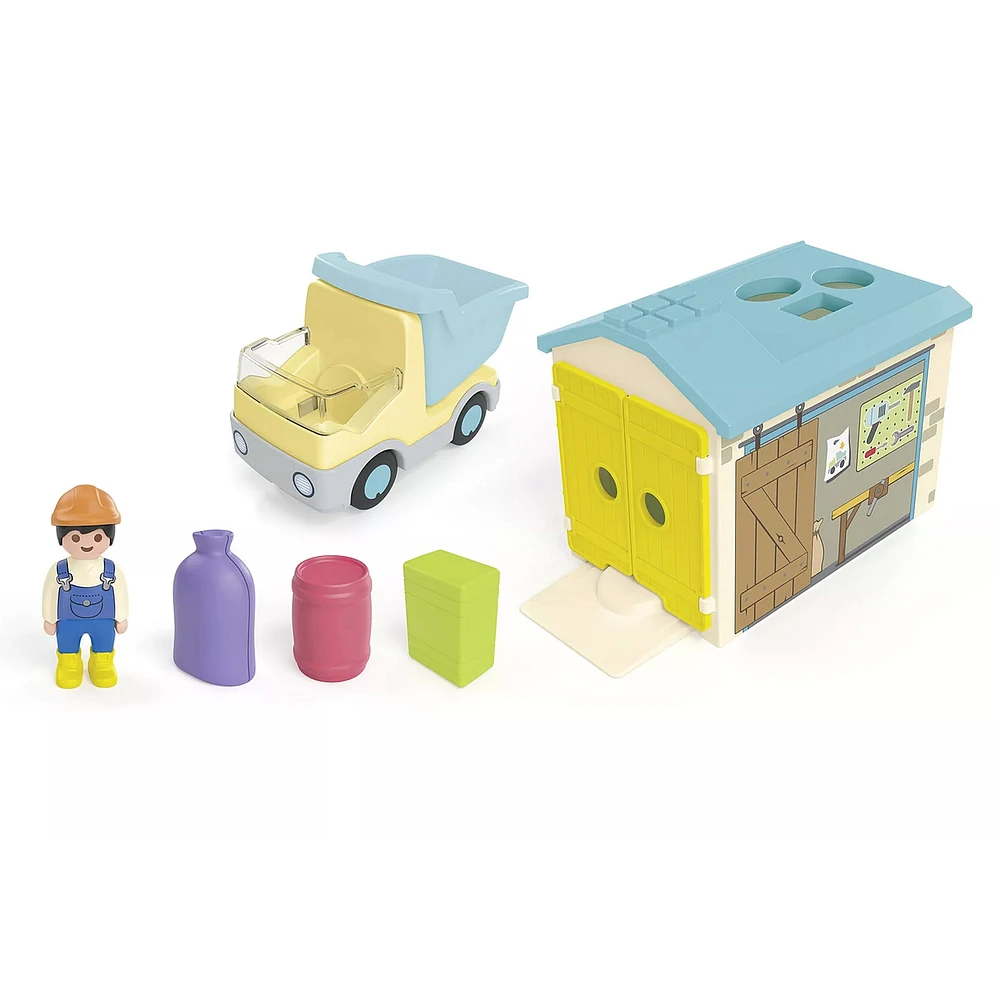 Ouvrier Avec Camion Et Garage
