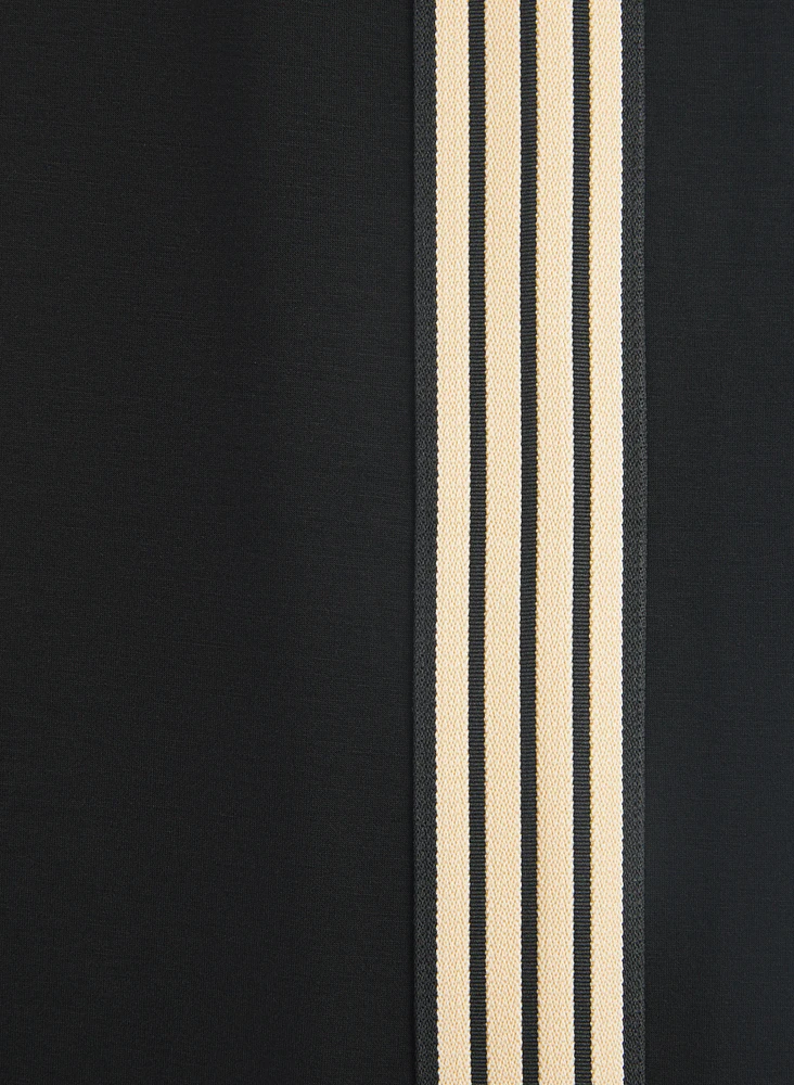 Pantalon à jambe large bandes contrastantes