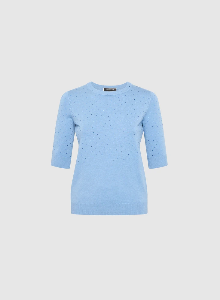 Pull à embellissements de pierres