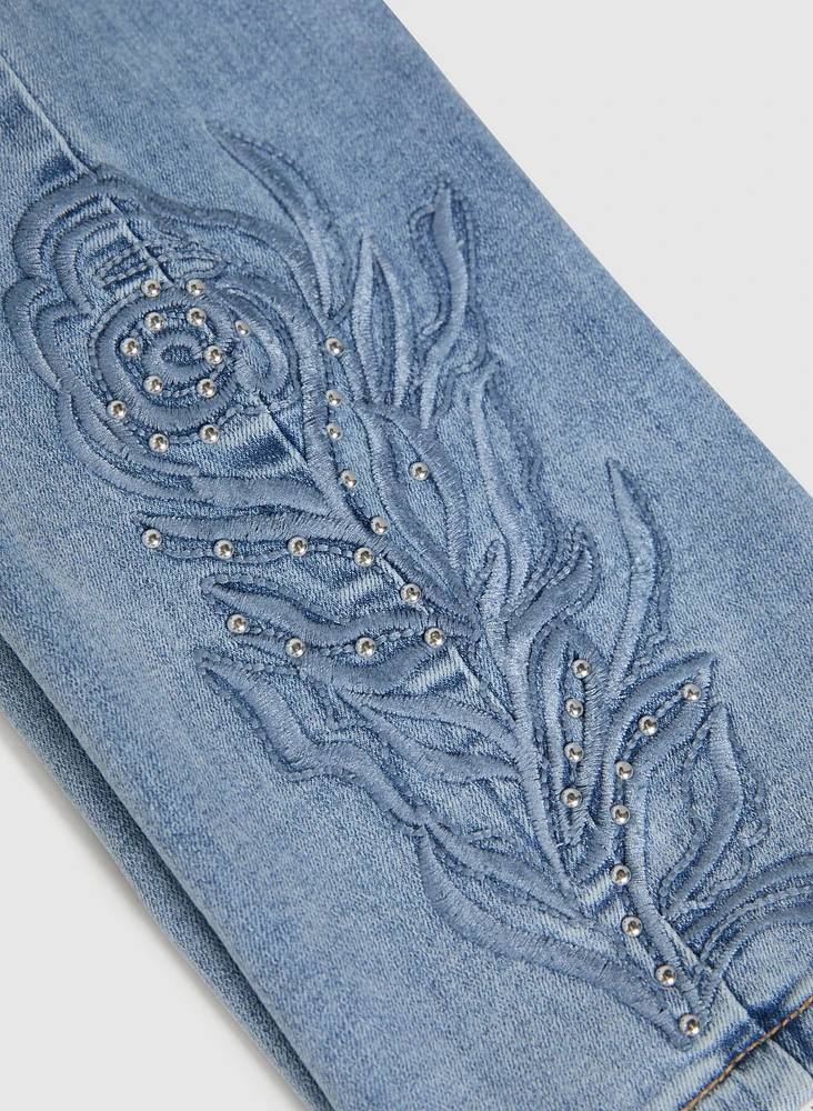 Jean à jambe droite broderies
