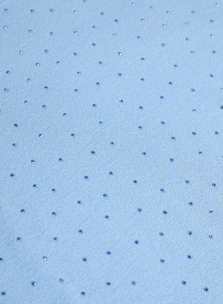 Pull à embellissements de pierres