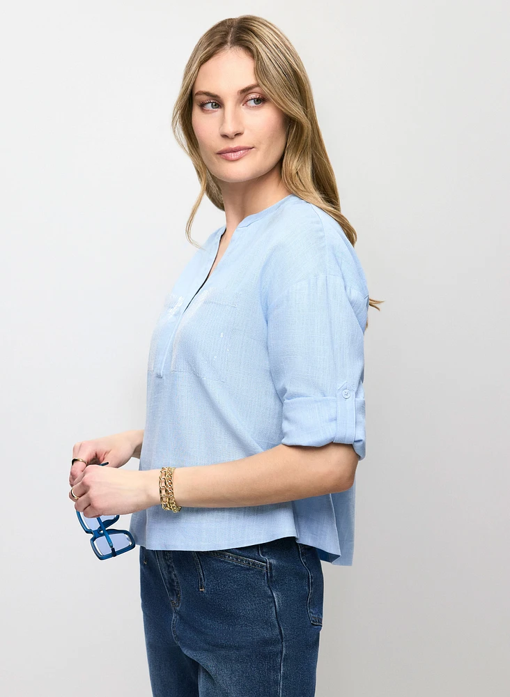 Blouse en lin avec poches à paillettes