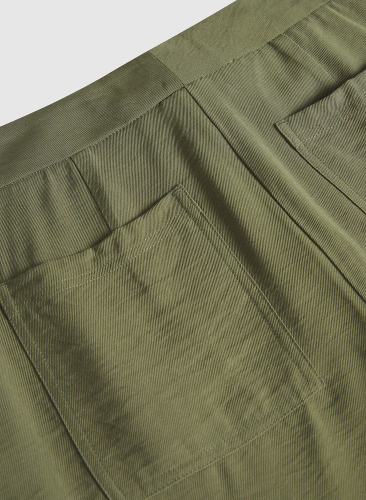 Pantalon à jambe droite écourtée