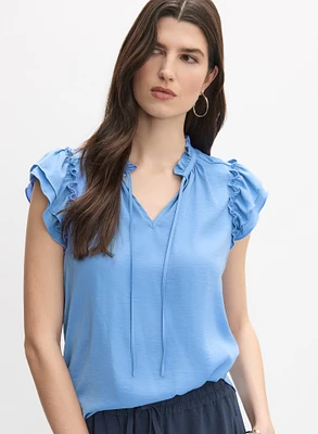 Blouse satinée avec lien à l’encolure