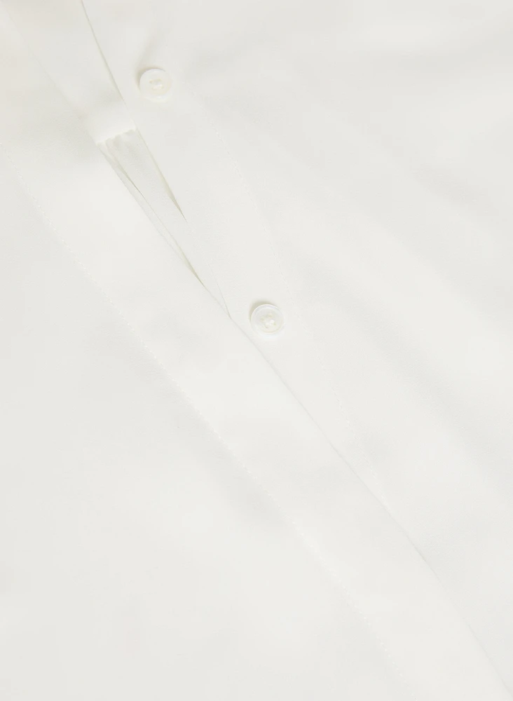 Blouse à col montant