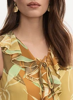 Blouse sans manches à volants