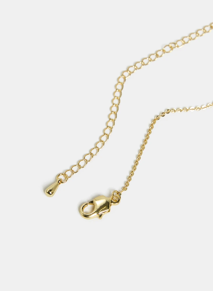 Collier à pendentif trèfle de résine