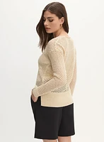 Pull à encolure en V tricot ajouré