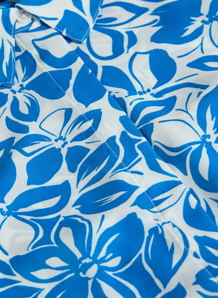Blouse fleurie en crêpe sans manches
