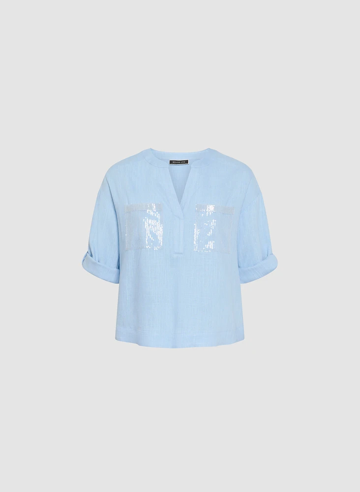 Blouse en lin avec poches à paillettes