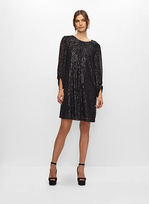 Robe à paillettes manches bouffantes
