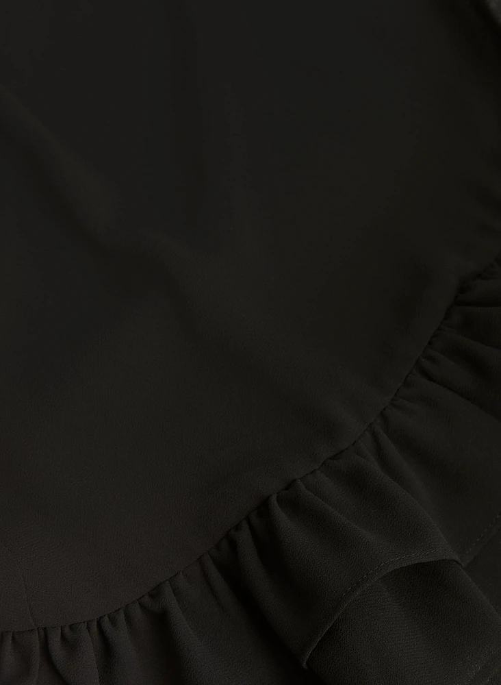Robe à manches cloche et volants