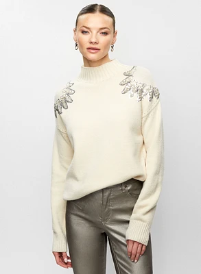 Pull à col montant et épaules pailletées