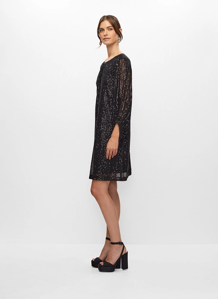 Robe à paillettes manches bouffantes