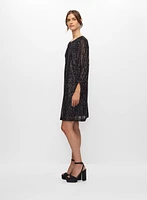 Robe à paillettes manches bouffantes