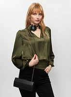 Haut satiné à pois et détails froncés