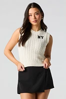 Veste en tricot torsadé avec motif brodé
