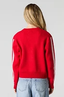 Chandail en tricot jacquard à manche rayée