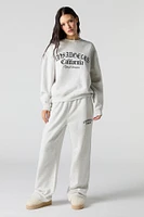 Pantalon d'entraînement à jambe large en molleton avec motif
