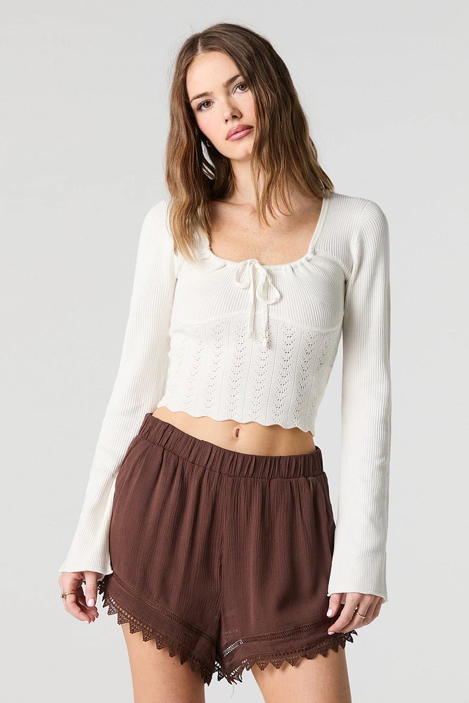 Short à taille élastique avec bordure en dentelle