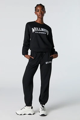 Jogger en molleton avec motif brodé destination