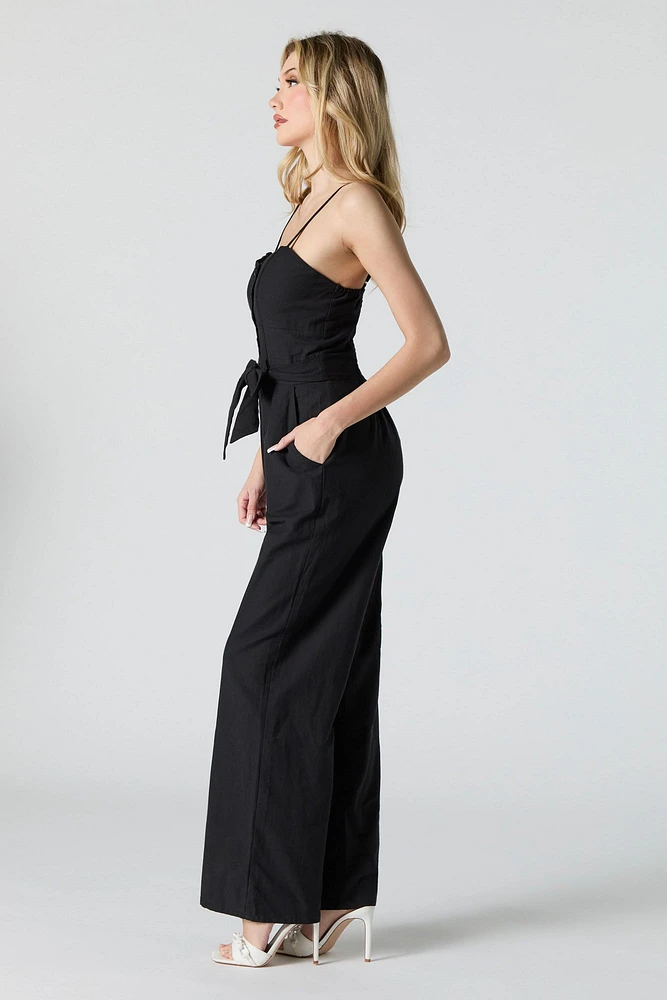 Combinaison jambe large avec ceinture et devant boutonné