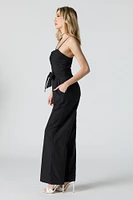 Combinaison jambe large avec ceinture et devant boutonné