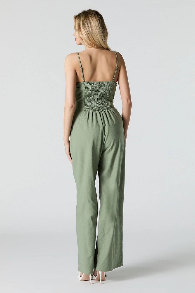 Combinaison jambe large avec ceinture et devant boutonné