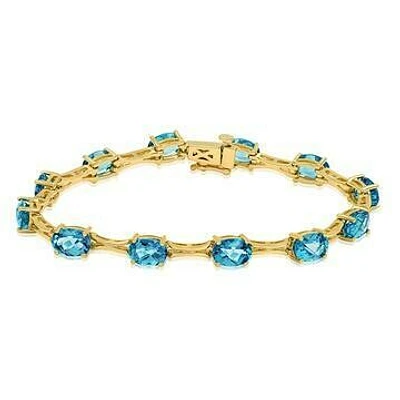 Oval Blue Topaz Bracelet Yellow Gold