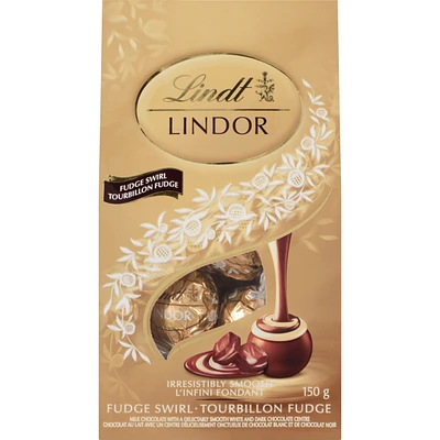 Chocolat au lait avec un centre délicieusement onctueux de chocolat blanc et de chocolat noir tourbillon fudge