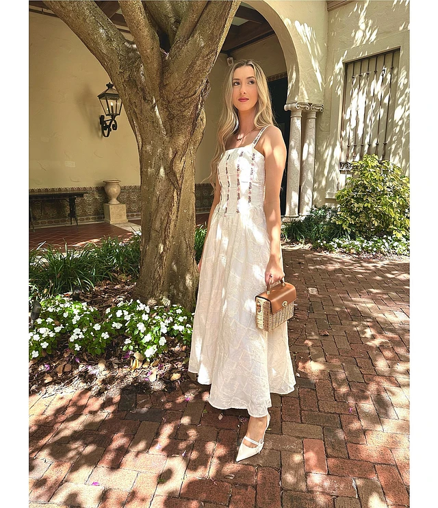 Agua Bendita Emerald Embroidered Square Neck Sleeveless Maxi Dress at CoolSprings Galleria in Franklin, TN Agua Bendita Emerald Embroidered Square Neck Sleeveless Maxi Dress at CoolSprings Galleria in Franklin, TN