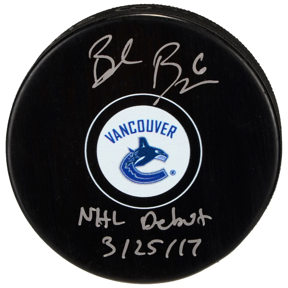 Brock Boeser Vancouver Canucks Autographed Hockey Puck with "NHL Debut 3/25/17" Inscription