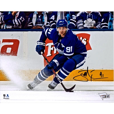 John Tavares Toronto Maple Leafs Autographed 8" x 10" Blue Jersey Turning Horizontal Photograph
