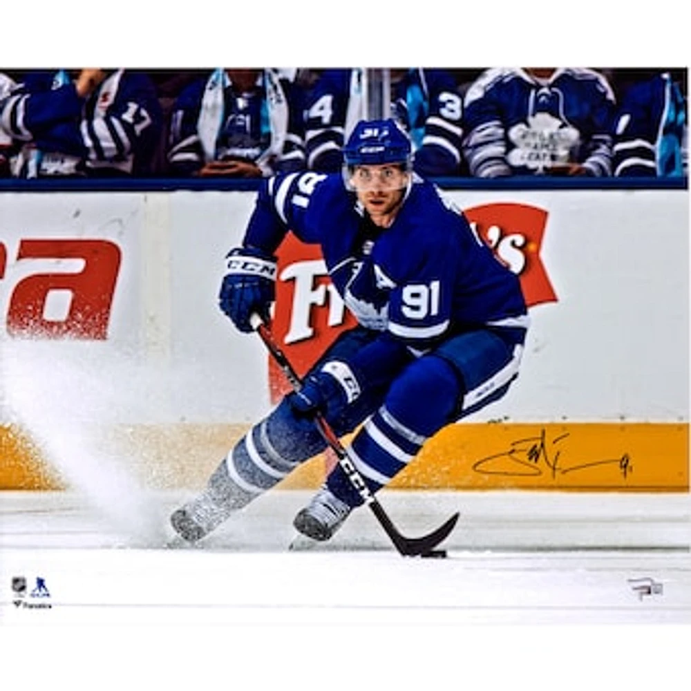 John Tavares Toronto Maple Leafs Autographed 16" x 20" Blue Jersey Turning Photograph