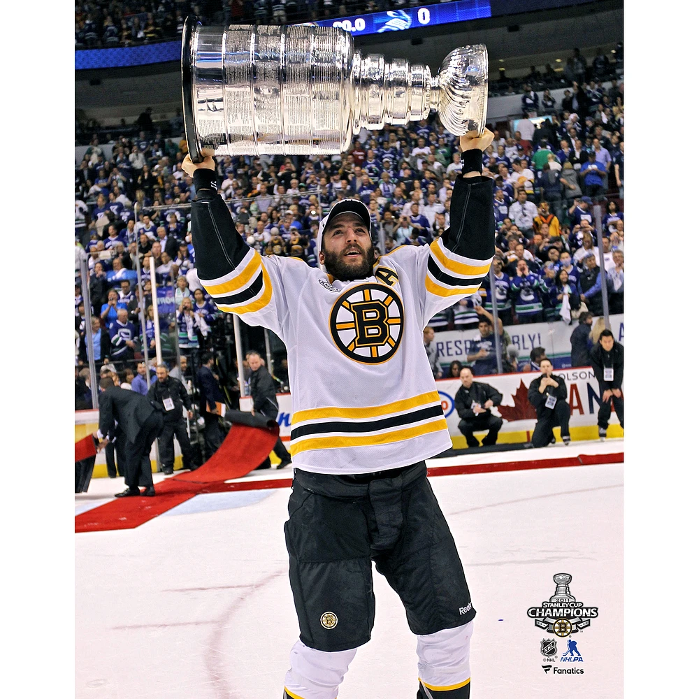Patrice Bergeron Boston Bruins Unsigned 2011 Stanley Cup Champions Raising Cup Photograph